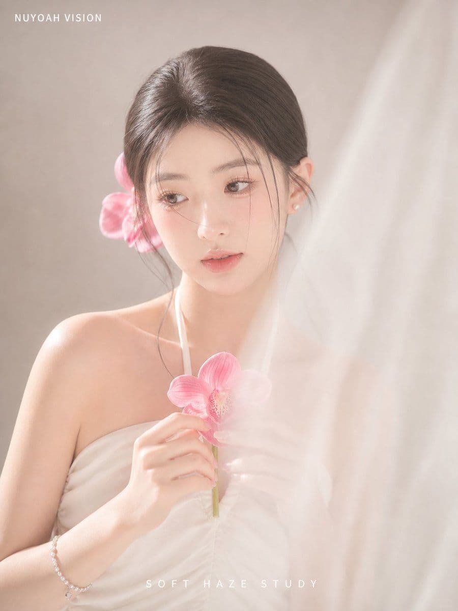 Soft Haze Orchid Studio Portrait