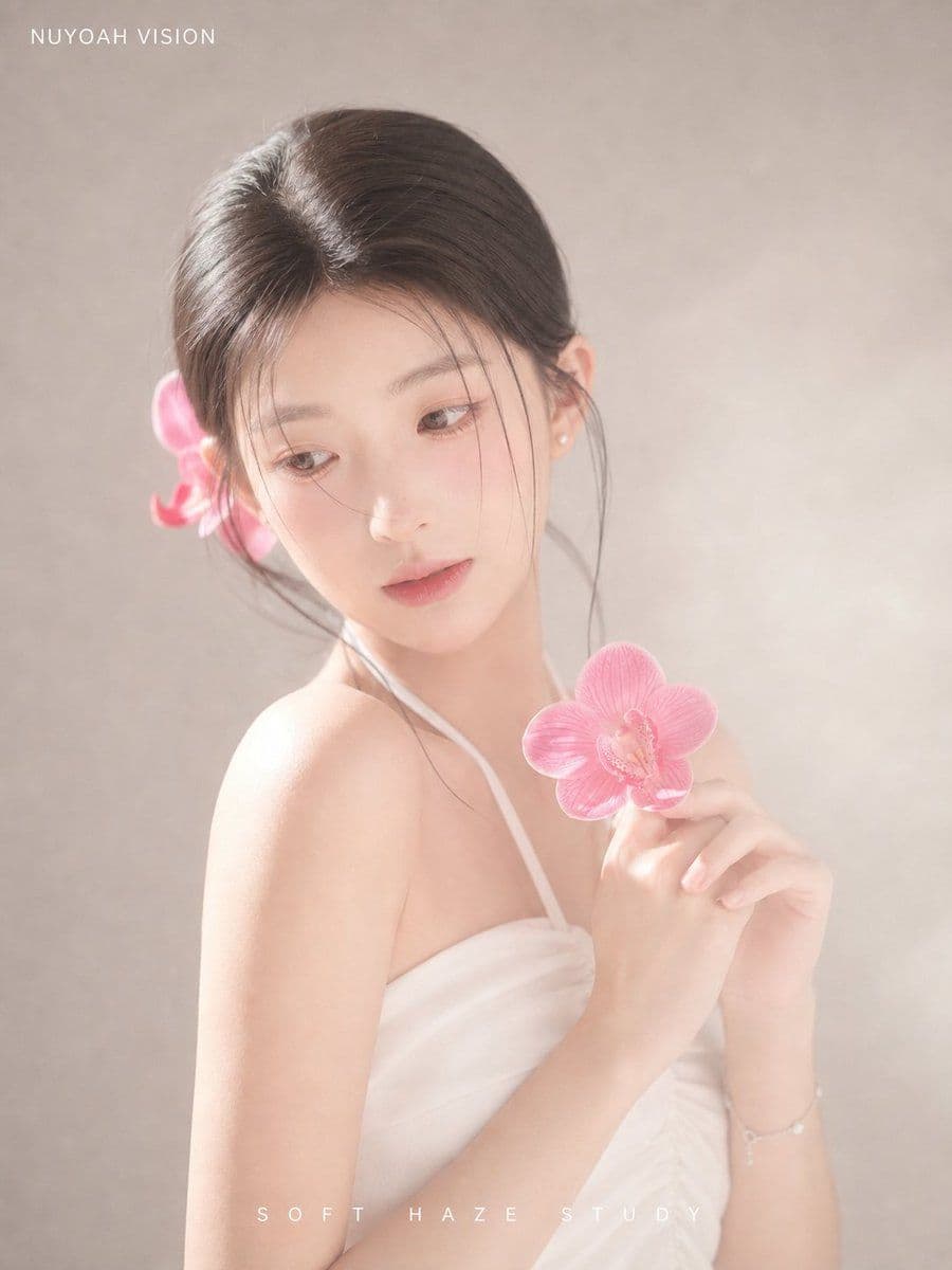 Soft Haze Orchid Studio Portrait